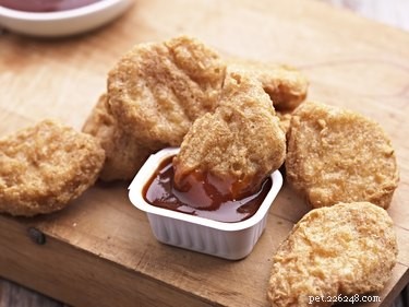Are Chicken Nuggets Safe for Dogs? Health Tips & Alternatives